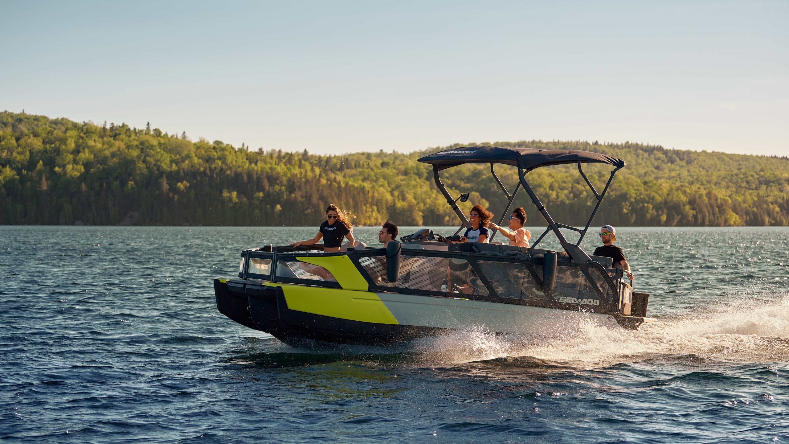 Neon Yellow Action Switch Pontoon speeding on water